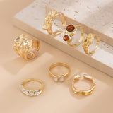 Gilded Drama: 7-Piece Statement Ring Set