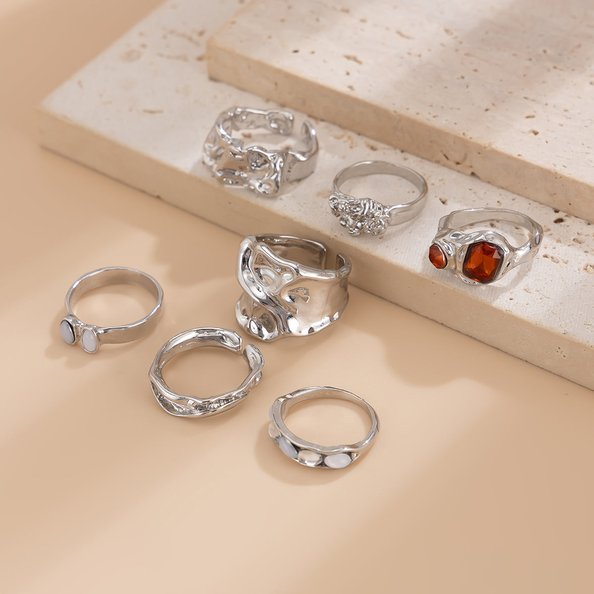 Gilded Drama: 7-Piece Statement Ring Set