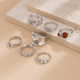 Gilded Drama: 7-Piece Statement Ring Set