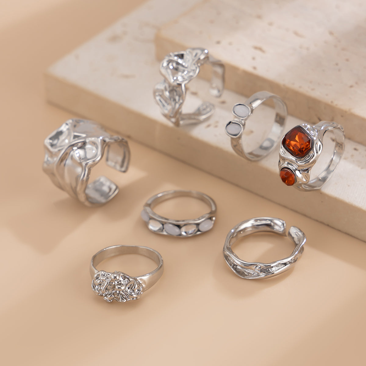 Gilded Drama: 7-Piece Statement Ring Set