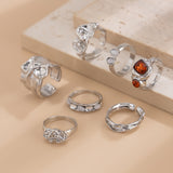 Gilded Drama: 7-Piece Statement Ring Set